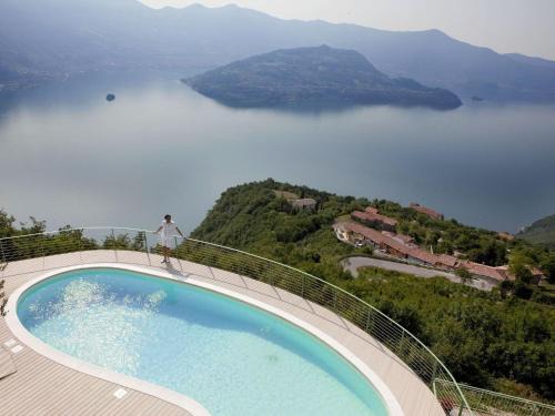 Plassi Apartment | Apartment Mantegna - garten mit seeblick und schwimmbad by Interhome