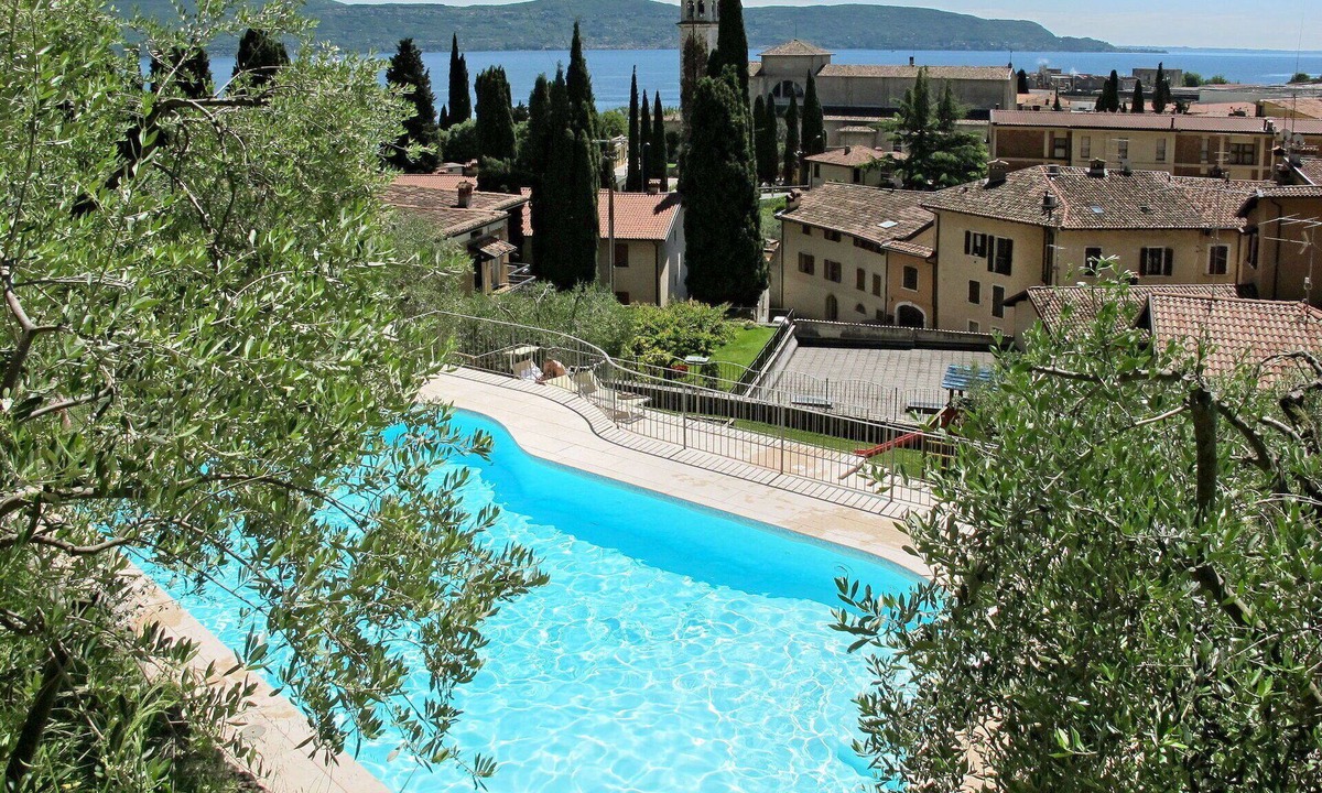 Pulciano Apartment | Cosy apartment for 4 people with pool, WIFI, A/C, TV, patio and pets allowed