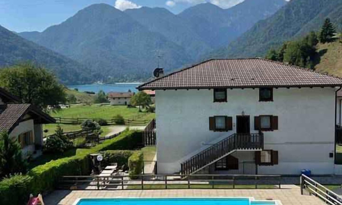 Mezzolago Apartment | Holiday apartment with pool and mountain view