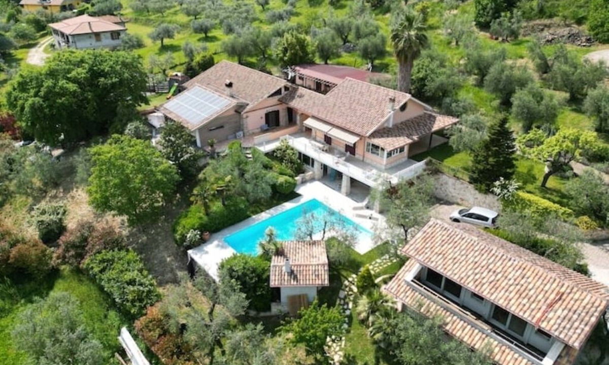 Fara in Sabina Villa | Sabina olive green vacation home with padel court and pool