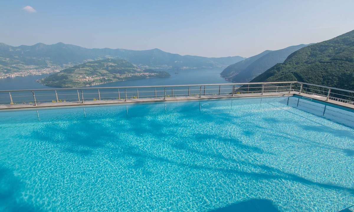 Plassi Apartment | Wohnung mit Panaoramaterrasse und Pool by Interhome