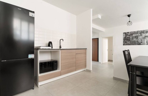 Giambellino Apartment | A cozy 60 sqm apartment that sleeps up to 4 people, located on the semi-basement level of a building (accessible via stairs).The neighborhood is well-connected to the city center and major attractions by public transport; the Tolstoj stop on the M4 met