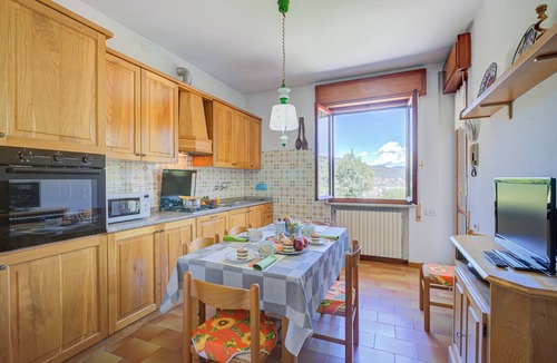 Laveno Apartment | A Due Passi Dal Bosco: Hillside Apartment with Garden&BBQ, Laveno Mombello, Italy