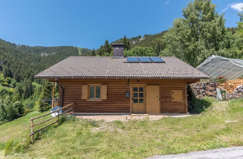 Palu del Fersina House | Alpine Holiday Home "Baita Serpillo" with Unique Mountain Views and Private Garden