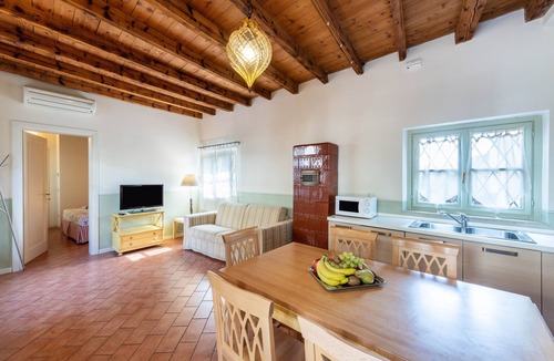 San Felice del Benaco Apartment | Apartment 'Villa Antica Torre Boccaccio' with Shared Pool, Wi-Fi and Air Conditioning