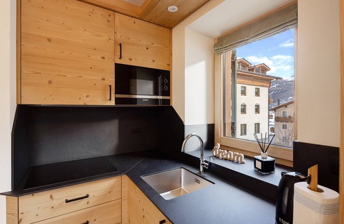 San Rocco Apartment | Apartment "Corolla Rosina's Home" with Mountain View, Balcony & Wi-Fi