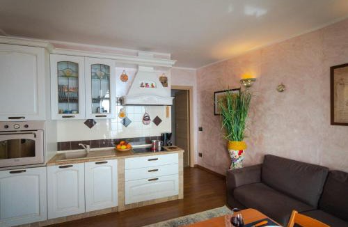 Plassi Apartment | Apartment Mantegna - garten mit seeblick und schwimmbad by Interhome