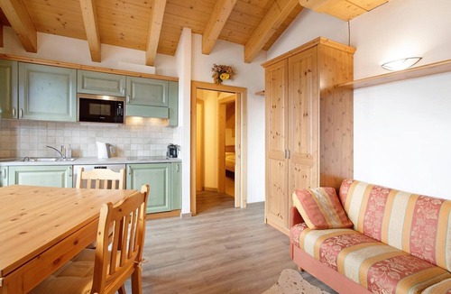 Livigno Ski Chalet | Apartment 'Rododendro' with Mountain View, Shared Garden and Wi-Fi