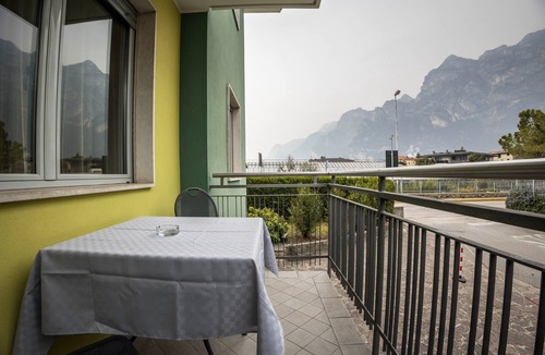 Riva del Garda Apartment | Apartment "Verde House 1" with Mountain View, Balconies, Shared Garden & Wi-Fi