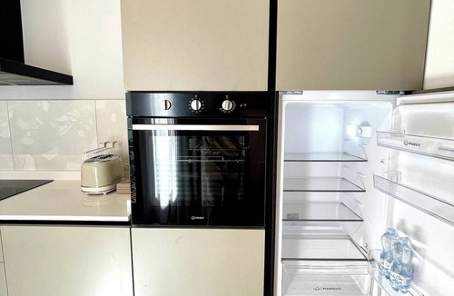 City Center Padova Apartment | Design and comfort with Private Patio, steps from the Basilica of Saint Anthony.