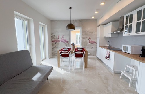 Sottomarina Apartment | Farmont Seafront Flamingo Suite by Ca-Sa Check