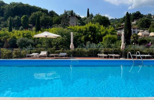 Morgnaga Apartment | Feli Holiday Home - Panoramic pool lake view in Gardone Riviera