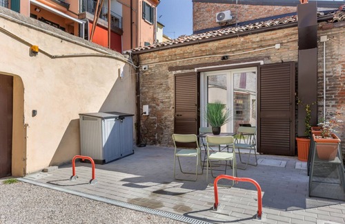 Ferrara Historic Centre Apartment | GuestHost - Bright Apartment with Patio & Parking