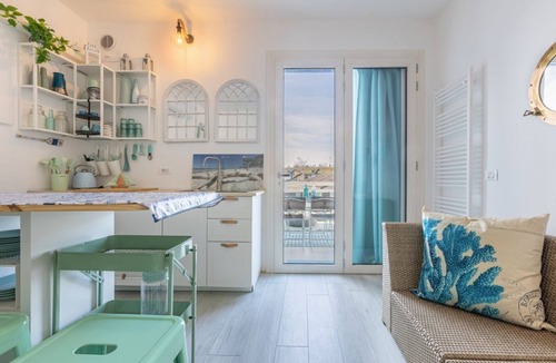 Lido di Pomposa Apartment | GuestHost - Cozy 42 square meters apartment, perfect for two people, located on the first floor of a renovated building with a private entrance (no elevator).The property is located within a residence offering a seasonal swimming pool and a children's po