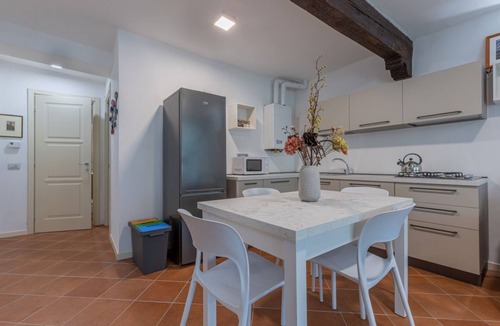 Ferrara Apartment | GuestHost - Charming 53 sqm apartment, ideal for groups of up to 5 guests, located on the first floor of a historic building without an elevator.Set in the heart of the historic centre, the accommodation is located on one of Ferrara’s most charming med