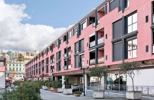 Genoa Apartment | GuestHost - Nice and bright studio apartment in the heart of the Old Port of Genoa, with large panoramic windows overlooking the dock. The apartment is only 300m from the Darsena underground and 800m from the Principe Square railway station. The Genoa Aq