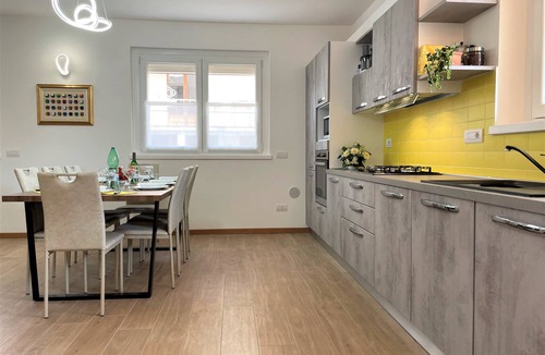 Verbania Apartment | HAPPY DAYS large ground floor apartment with garden and parking.