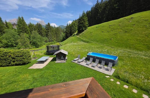Selva di Val Gardena Apartment | Holiday Apartment "Piciulei Pitl" with Mountain View, Garden, and Wi-Fi