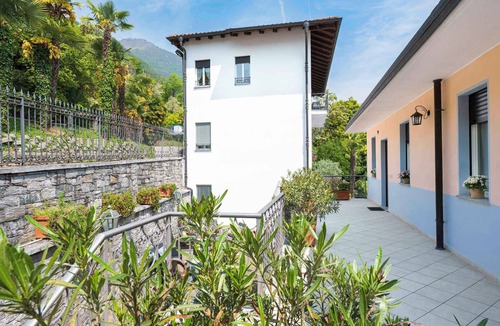 Oggebbio Apartment | Holiday apartment with private beach and balcony with lake view