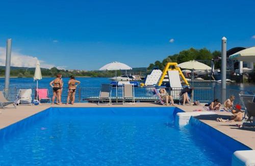 Castelletto Sopra Ticino House | Holiday Home Camping Italia Lido-1 by Interhome
