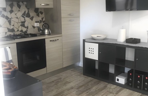 Jesolo Pineta House | Holiday Home 'Residenza Magnolia - Ground Floor' with Private Garden, Wi-Fi & Air Conditioning