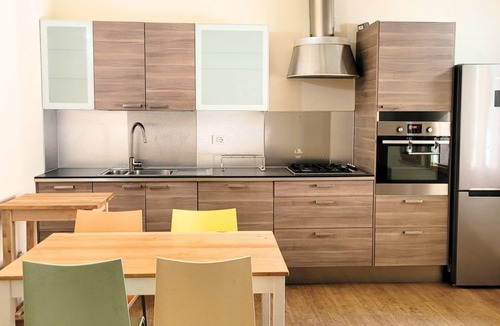 Cesenatico Apartment | Location: very central, a stone's throw from the sea and all services.Description: renovated apartment on the second floor of a very central building. Bright living room with dining table, kitchenette and two pouf beds. Two double bedrooms, two bathrooms