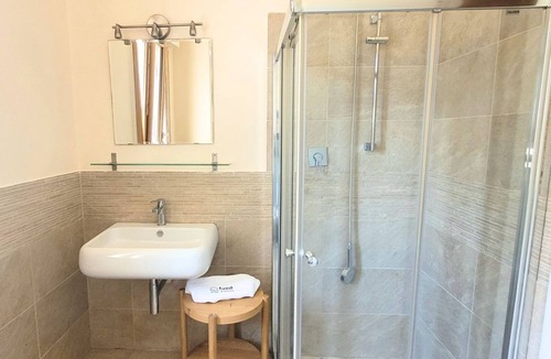 Cesenatico Apartment | Location: very central, a stone's throw from the sea and all services.Description: renovated apartment on the second floor of a very central building. Bright living room with dining table, kitchenette and two pouf beds. Two double bedrooms, two bathrooms
