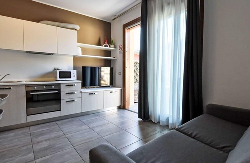 Spinone Al Lago Apartment | Lovely apartment for 6 guests with A/C, pool, WIFI, TV and terrace