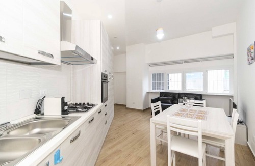 Vittoria Apartment | Modern 70 m2 apartment located on the mezzanine floor of an elegant condominium, a stone's throw from Piazza Statuto, in an ideal position for being able to move around the city comfortably.The Principi D'Acaja subway stop is 1 km away, the Porta Susa