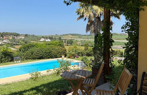 Misano Monte Apartment | Prestigious apartment with two double bedrooms in a Relais with a pool