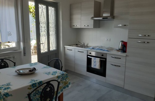 Arizzano House | red fountain house