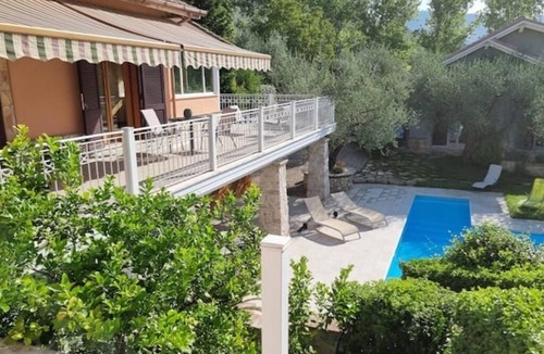 Fara in Sabina Villa | Sabina olive green vacation home with padel court and pool