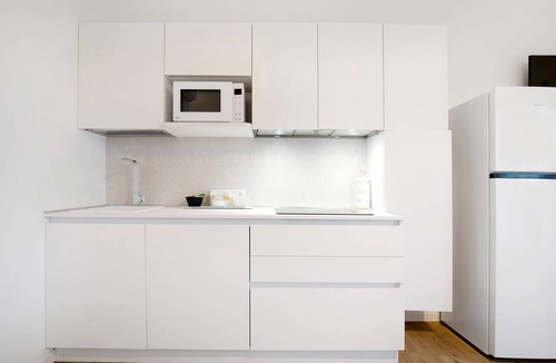Lido di Jesolo Apartment | Studio Apartment 'Open Space 2' with Shared Garden, Wi-Fi and Air Conditioning