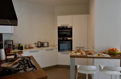 Lovere Old Town Apartment | Stylish Lakefront House is a beautiful and spacious 2 bedroom apartment, with plenty of light coming from the big and many windows overlooking the lake and the harbor, the apartment boasts a Spacious lounge with breathtaking lake view where you can lay d
