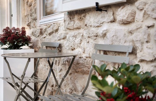 Assenza Apartment | Suite bedroom (21 m2) with shared terrace, sauna and olive garden view