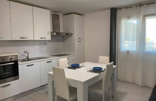 Camponogara Apartment | The SpaceWelcome to our beautiful recently renovated home in Camponogara, ideal for a relaxing getaway for up to 4 people. This charming accommodation offers a shared pool with two other families, perfect for cooling off and enjoying the sun on comfortab