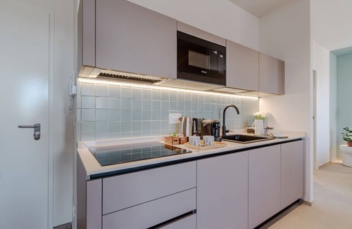 Lingotto Apartment | This large studio apartment is ideally located for exploring Turin, with easy access to the subway, allowing you to reach the city center in just a few minutes and the lively San Salvario neighborhood in even less time. Just steps from Parco del Po, the