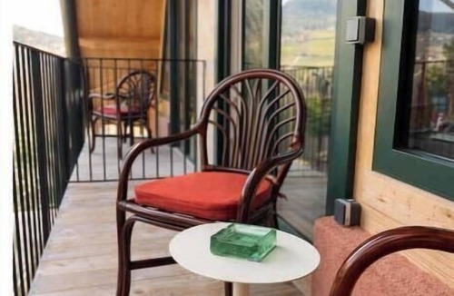 Soprabolzano Apartment | To the Bahngarten 1907 – Historic train station building with a panoramic view
