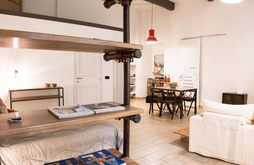 Historic Centre Apartment | Turin’s Hideaway: A Charming Loft with History