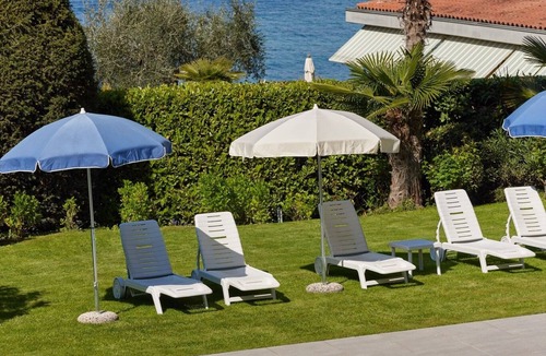 Malcesine Apartment | Villa Sopri - directly on the lake, with beautiful garden and pool CIN IT023045B4Y9EMQA9O