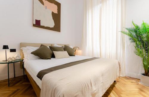 Gioia Apartment | VivimiHome - Lusso Segreto tra Centrale e Isola