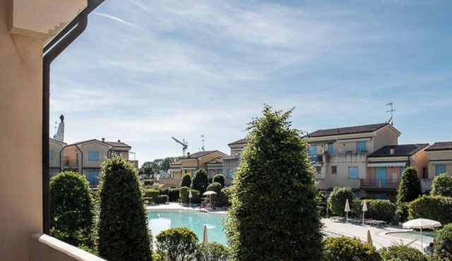 Apartment 'Residence Borgo Dei Fiori E08' with Shared Pool and Private Terrace