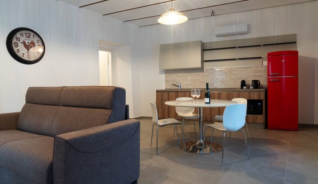 Apartment where light meets ancient stone