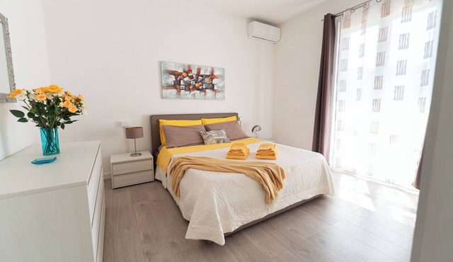 Bright two-room apartment with private terrace and garden