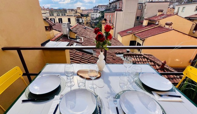 Harbor House. Relaxed and fun atmosphere with a view of the rooftops of Bologna.