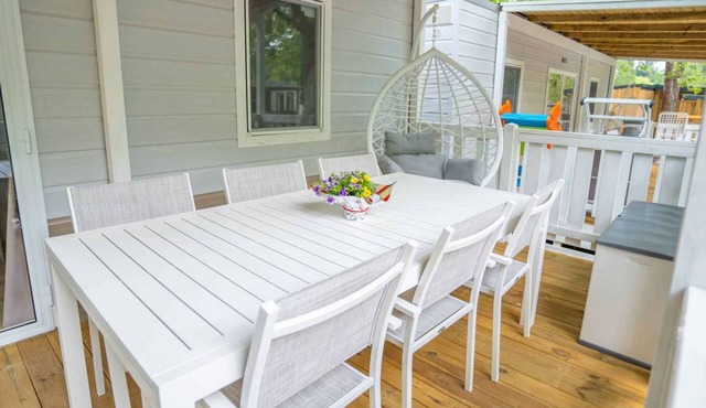 Mobile home with air conditioning, terrace and water park