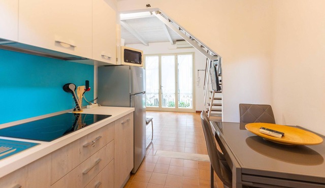 Seaside villas in a small complex surrounded by greenery by the sea