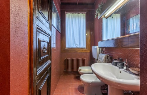 Ferrara Apartment | GuestHost - Stunning ground floor apartment in a modern villa, perfect for up to 5 people.Immersed in a charming garden with pine forest and swimming pool, the accommodation is located in a quiet residential area equipped with all services, a short dista