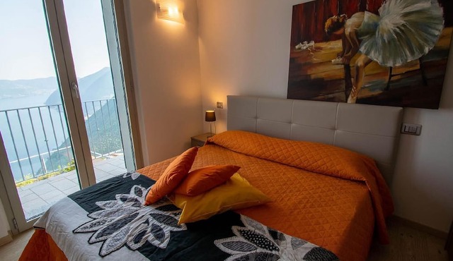 Holiday Apartment in Plassi with Panoramic Terrace and Lakefront View